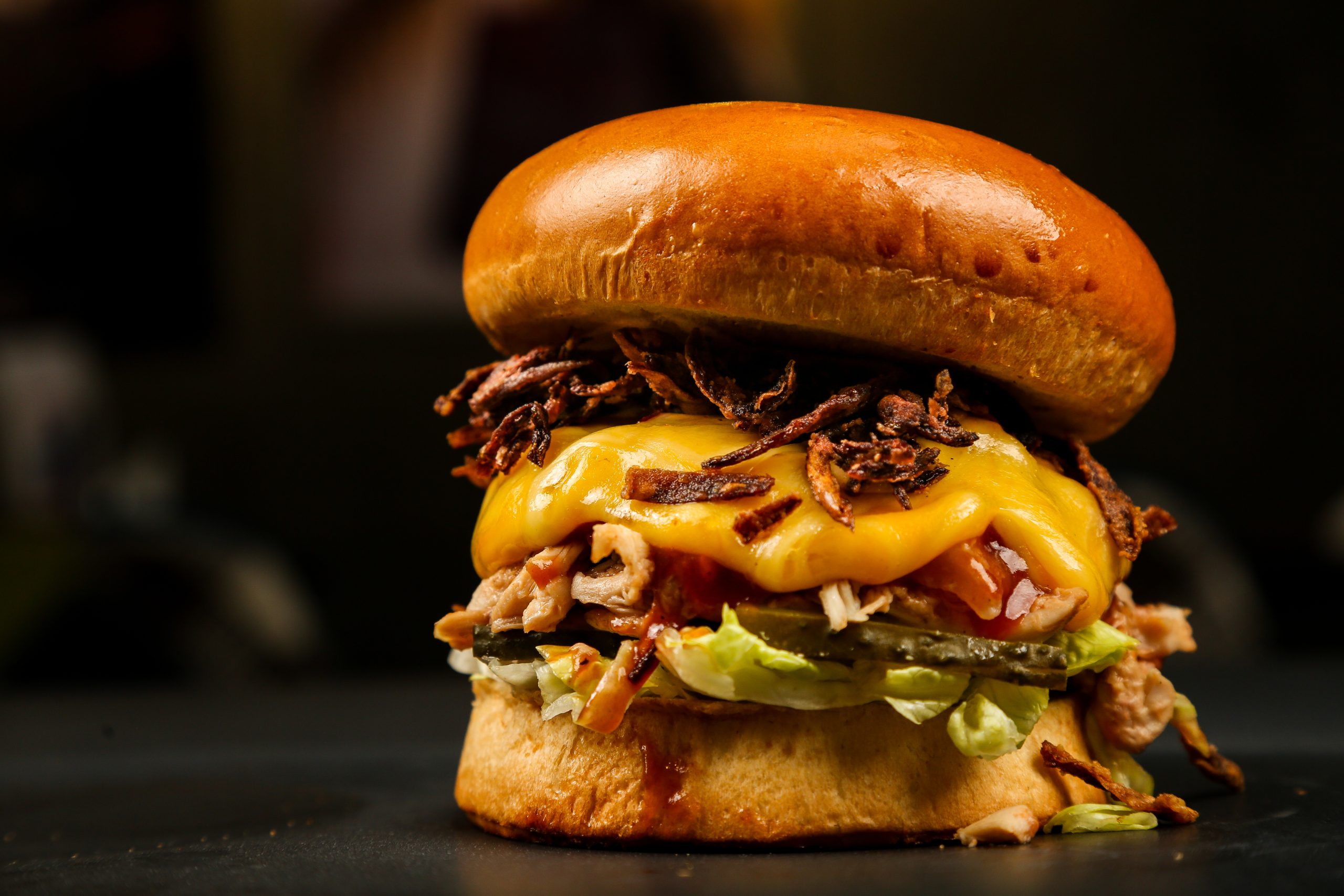 front view burger on a stand